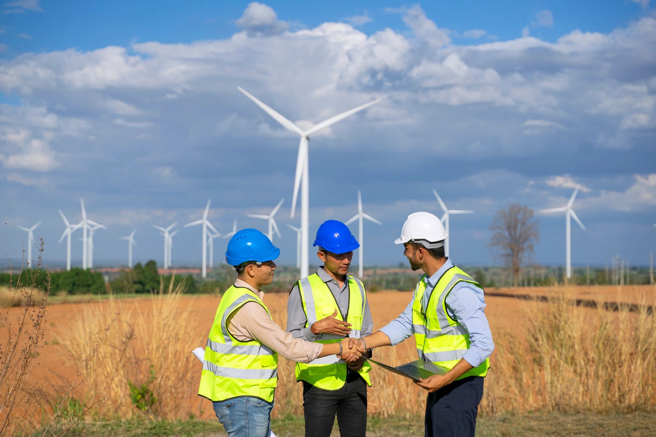 Electrical workers at an energy infrastructure site